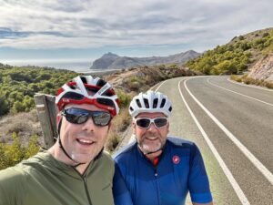 Cyclists riding the Green Mile climb near Portman and Atamaría, La Manga Club