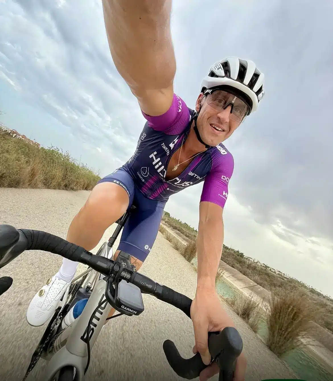 Road cyclist enjoying an OriMar Bikes BMC hire bike in Spain