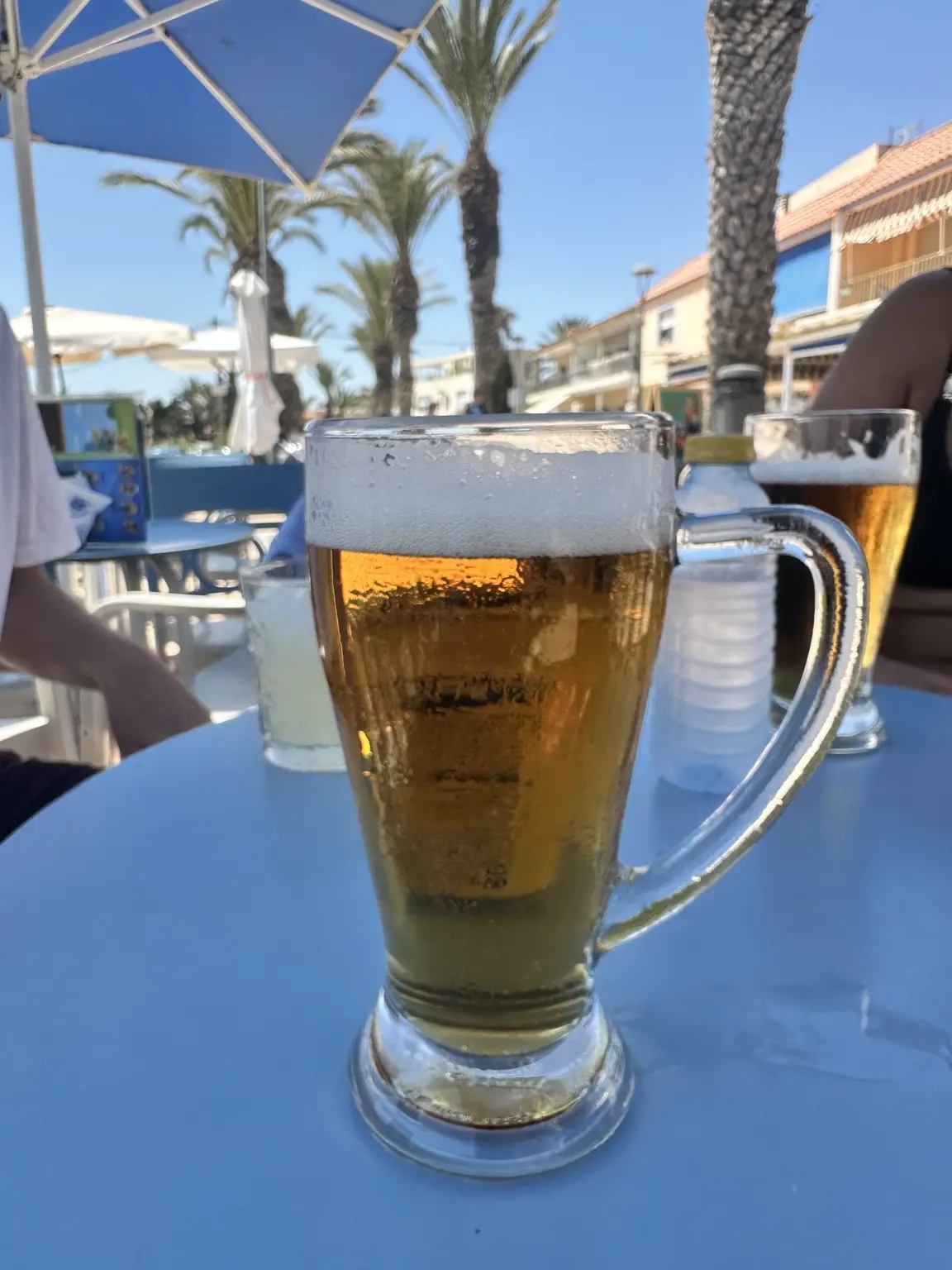 A sunny café stop after cycling with OriMar Bikes